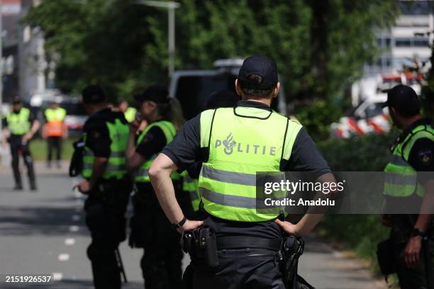 Police take measures at the designated location where the Patriotic Europeans Against the Islamisation of the West leader Edwin Wagensveld burned the...