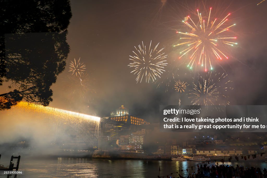 Colorful beautiful fireworks over douro river in porto portugal on sao joao festival