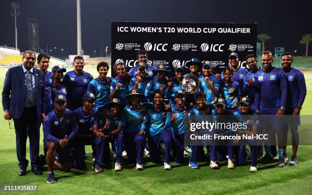 Players and Staff of Sri Lanka poses with the ICC Women's T20 World Cup Qualifier 2024 Trophy following the ICC Women's T20 World Cup Qualifier 2024...
