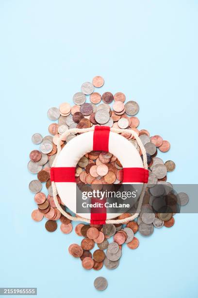 american currency beneath a lifebelt - help single word stock pictures, royalty-free photos & images
