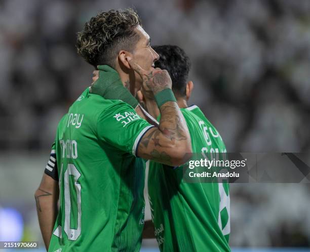 Players of Al-Ahli celebrate after score a goal during the Saudi Pro League week 31 match between Al-Ahli and Al-Shbab at Al Shabab FC Stadium in...