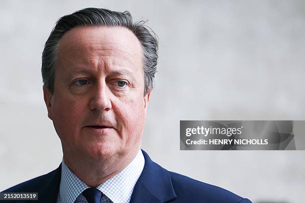 Britain's Foreign Secretary David Cameron arrives at the BBC offices in central London, on May 12 to appear on the BBC's "Sunday with Laura...