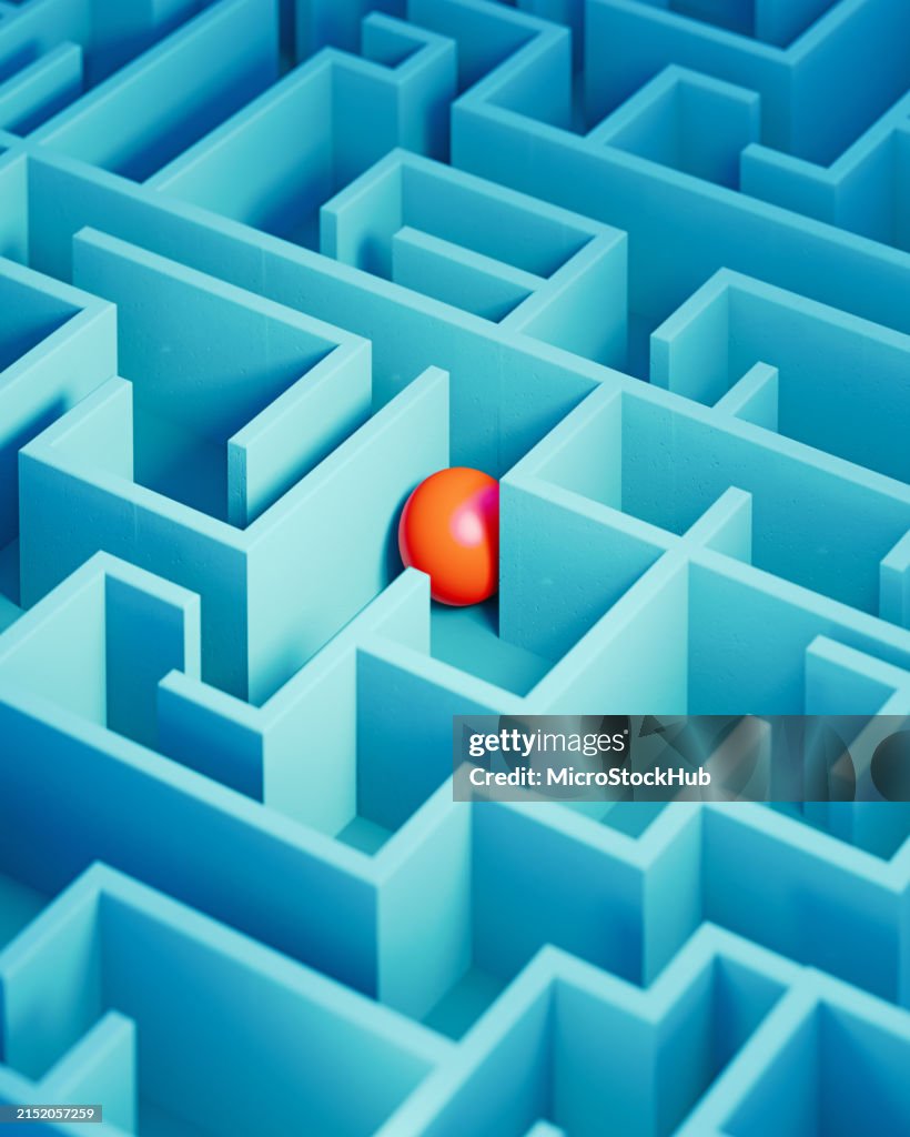 Red Colored Sphere Trapped Inside A Blue Maze - Solution Concept