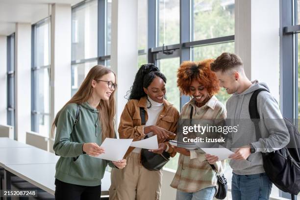 university students discussing exam results - student stock pictures, royalty-free photos & images