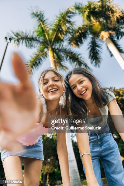 Friends Looking 27,414 Friends Looking Into Camera Stock Photos, High-Res Pictures, and ...