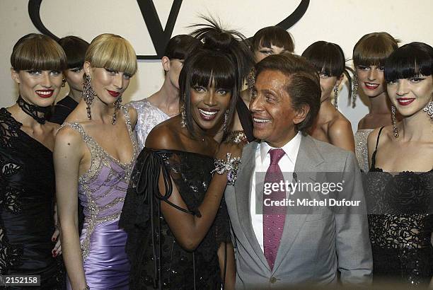 Model Naomi Campbell and designer Valentino pose during the Fall-Winter 2003-2004 Haute Couture collections on July 10, 2003 in Paris, France.