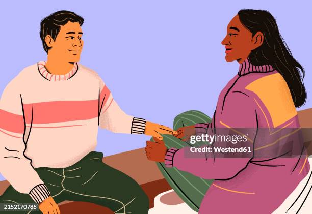 couple talking and sitting against colored background - two people talking studio stock illustrations