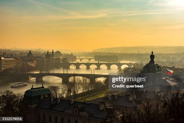 skyline prague with bridges at sunset - tschechische republik stock-fotos und bilder