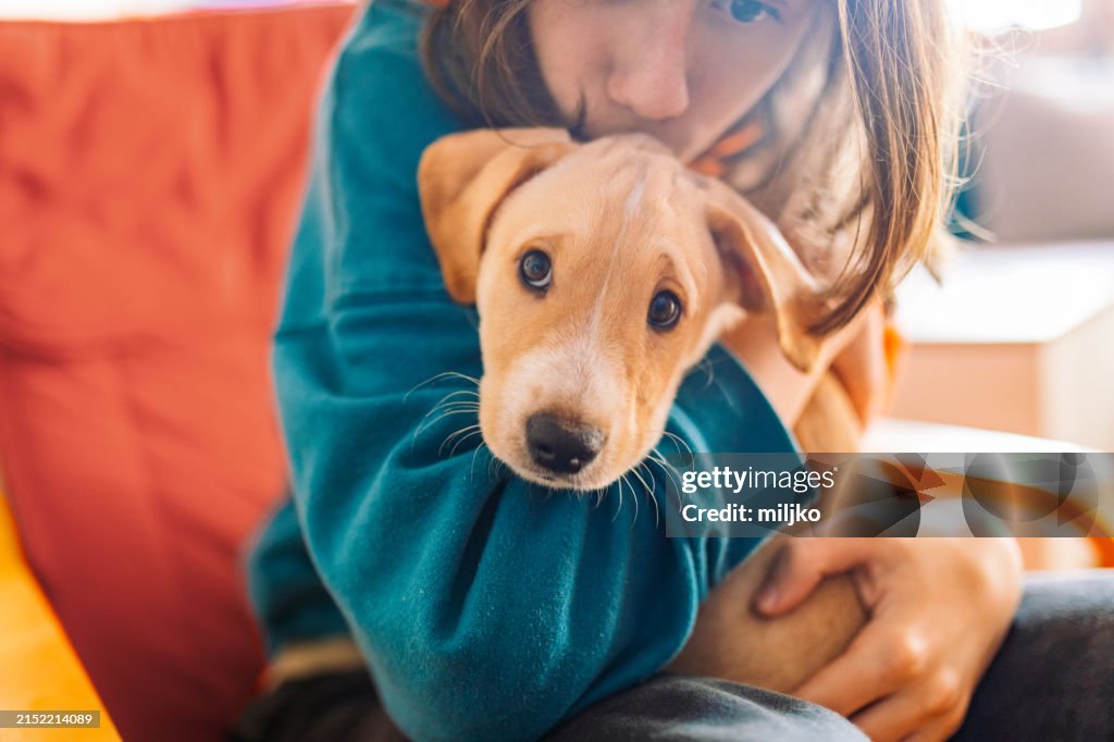 Teenage boy love his lovely dog