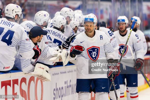 The France team is celebrating after scoring a goal during the IIHF Ice Hockey World Championship Group B match between Latvia and France in Ostrava,...