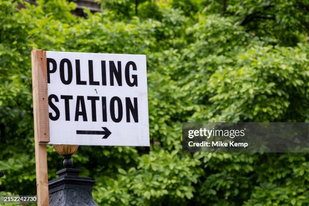 Polling station sign and trees on 6th May 2024 in London, United Kingdom.