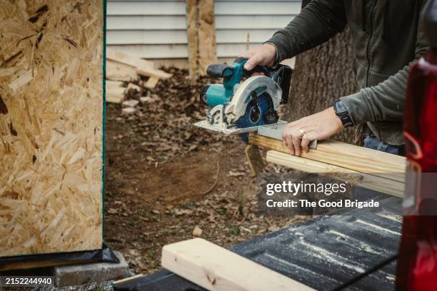 Man Using Saw 6,932 Man Using Circular Saw Stock Photos, High-Res Pictures, and ...