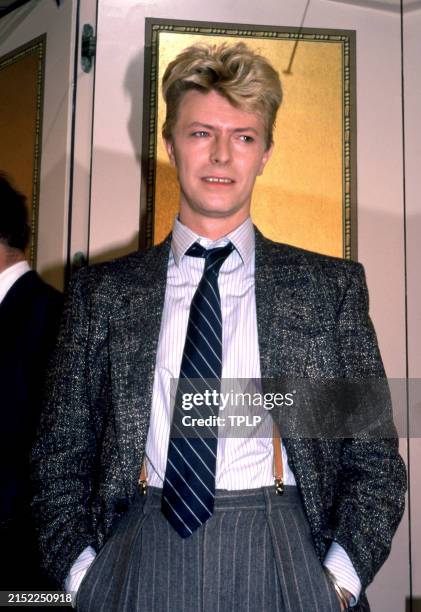 British musician David Bowie stands during EMI's announcement of his recording agreement at Caryle Hotel in New York, New York, January 27, 1983.