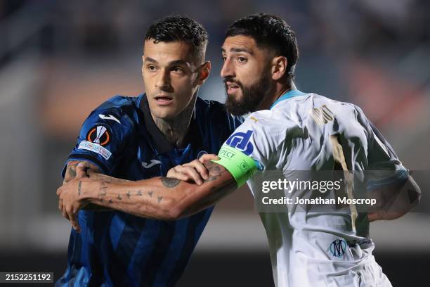 Gianluca Scamacca of Atalanta tussles with Samuel Gigot of Olympique De Marseille during the UEFA Europa League 2023/24 Semi-Final second leg match...