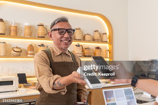 Customer paying on phone Customer paying on phone