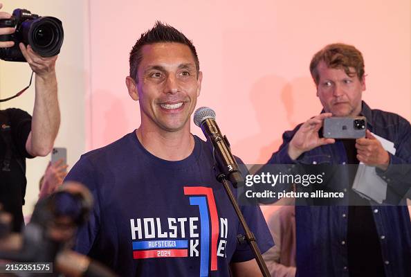Marcel Rapp Marcel Rapp, head coach of Holstein Kiel, stands on stage at a... News ...