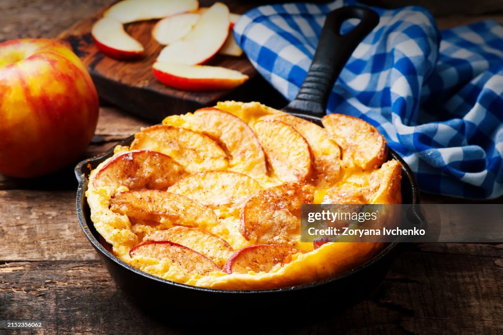 Cinnamon Apple Dutch Baby Pancake in iron pan