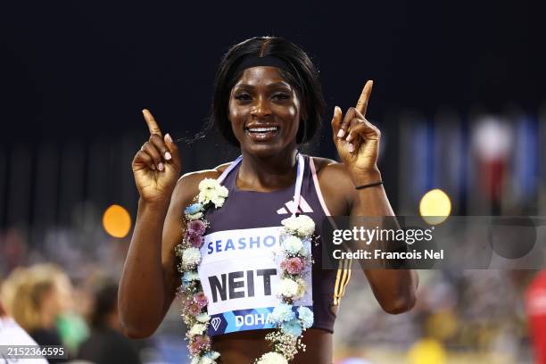 Daryll Neita of Team Great Britain celebrates after winning Women's 100 Metres during the 2024 Diamond League Doha meeting at Khalifa International...