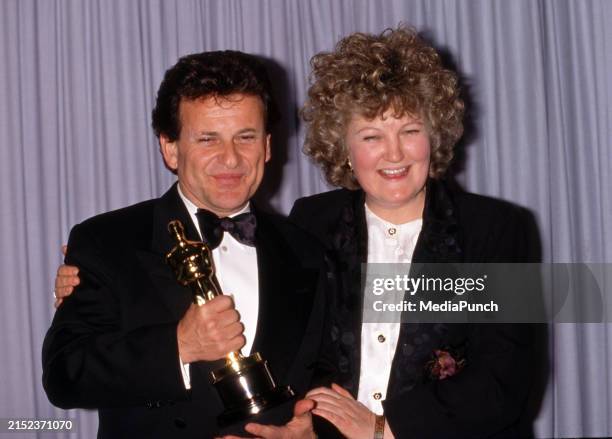 Joe Pesci And Brenda Fricker at the 63rd Academy Awards ceremony on March 25 at the Shrine Auditorium in Los Angeles, California Credit: