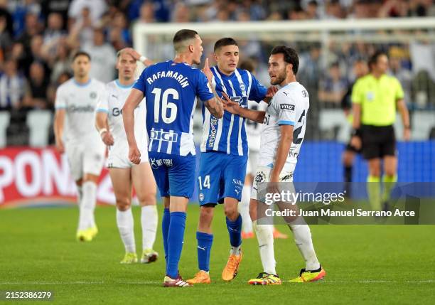 Rafa Marin of Deportivo Alaves and Eric Garcia of Girona FC clash