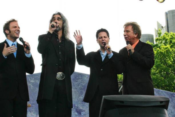 David Phelps , Guy Penrod , Mark Lowry and Bill Gaither of American southern gospel vocal group The Gaither Vocal Band during The Greater New York...