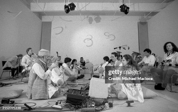 American composer and musician La Monte Young and his wife American light artist, designer Marian Zazeela sit during the La Monte Young Blues Band...