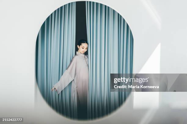 beautiful asian woman in a kimono. - beautiful curtains stock pictures, royalty-free photos & images