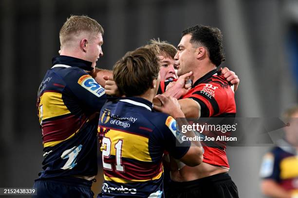 Sean Withy of the Highlanders and David Havili of the Crusaders have a disagreement during the round 12 Super Rugby Pacific match between Highlanders...