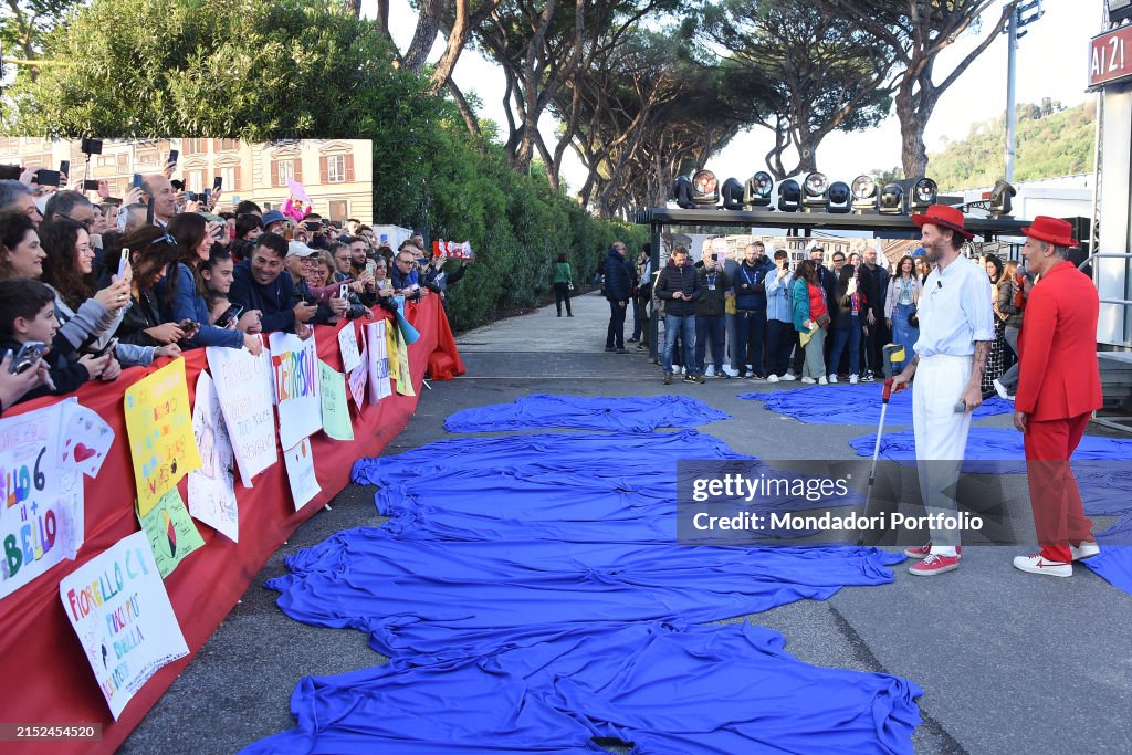 Vu Rai Italian singer Lorenzo Cherubini and the host and showman Rosario ...