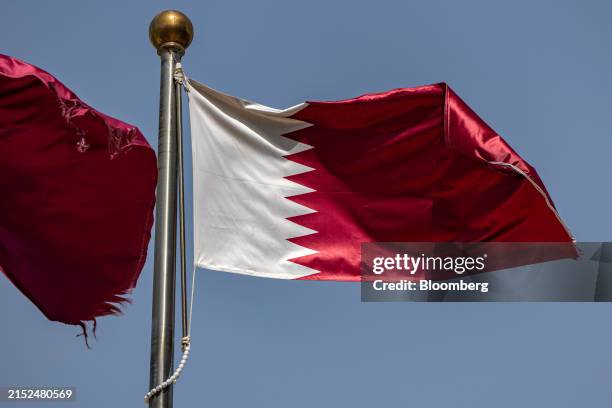 Qatari flag at the Qatar Economic Forum in Doha, Qatar, on Wednesday, May 15, 2024. More than 1,000 corporate and government leaders arrive in Qatar...