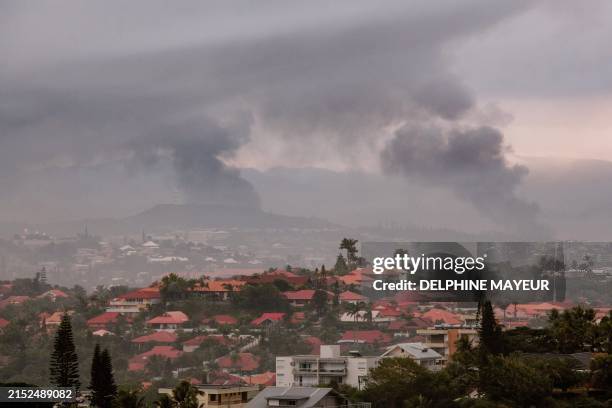View of the Motor Pool district of Noumea on May 15 amid protests linked to a debate on a constitutional bill aimed at enlarging the electorate for...