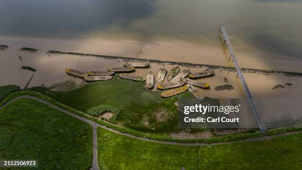 May 15: An aerial view shows concrete barges that were used in World War II and abandoned at Rainham Marshes, on May 15, 2024 in Rainham, United...