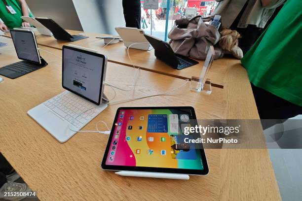 Customers are experiencing the newly released iPad Pro and iPad Air at the Apple Store in Shanghai, China, on May 15, 2024.