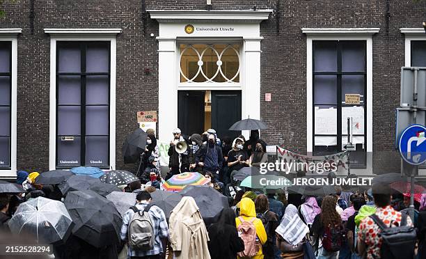 Protesters gather outside a building of Utrecht University as they continue their protest calling for the university to sever all ties with Israel...