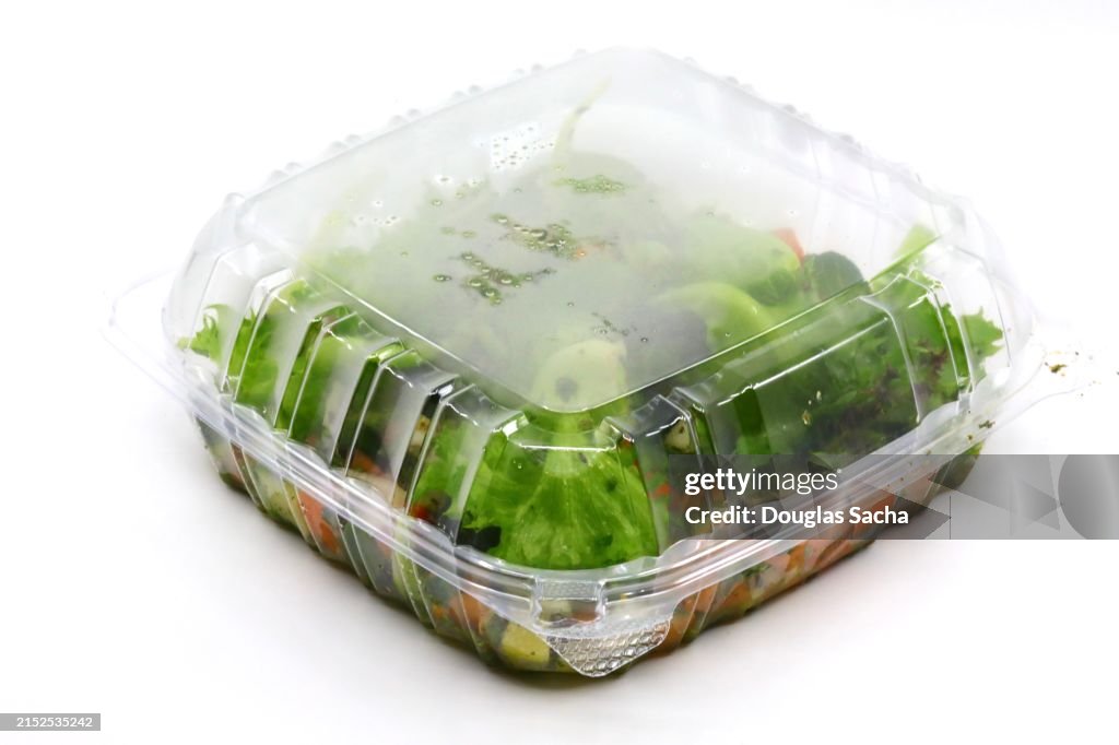 Vegetable salad in a clear disposable container