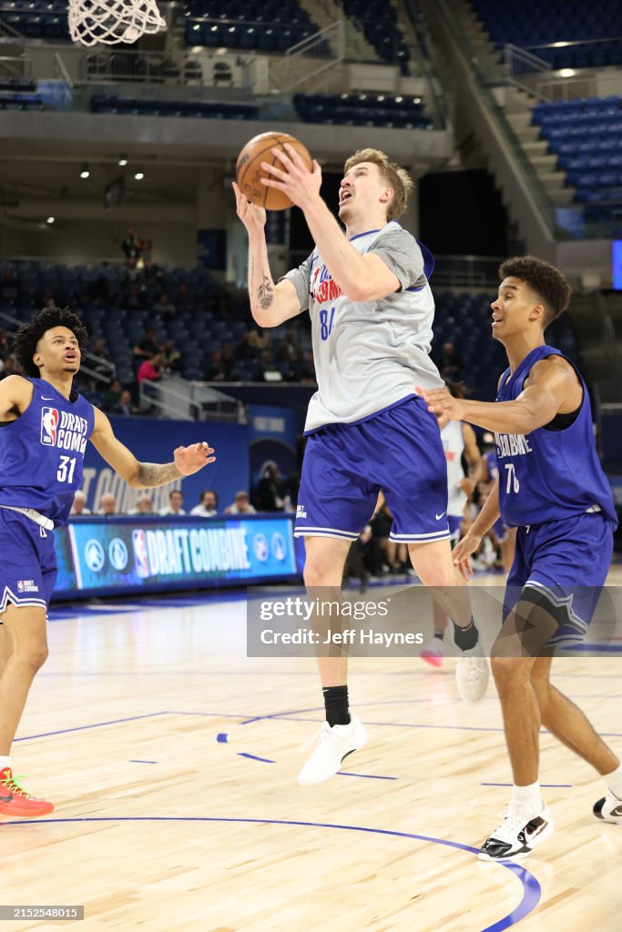 Baylor Scheierman drives to the basket during the 2024 NBA Combine on ...