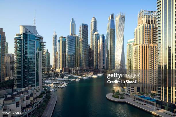 aerial view of cityscape in dubai uae. - dubai marina stock pictures, royalty-free photos & images