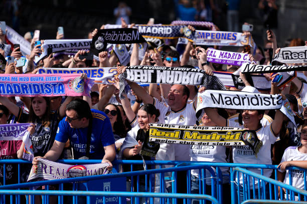 Supporters of Real Madrid are seen during the celebration of Real Madrid at Plaza de Cibeles for their 36th Championship Title of the Spanish League,...