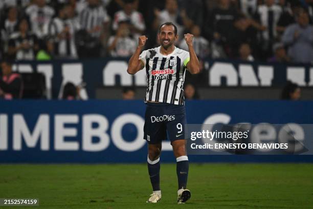 Alianza Lima's Argentine forward Hernan Barcos celebrates after scoring his team's first goal during the Copa Libertadores group stage second leg...