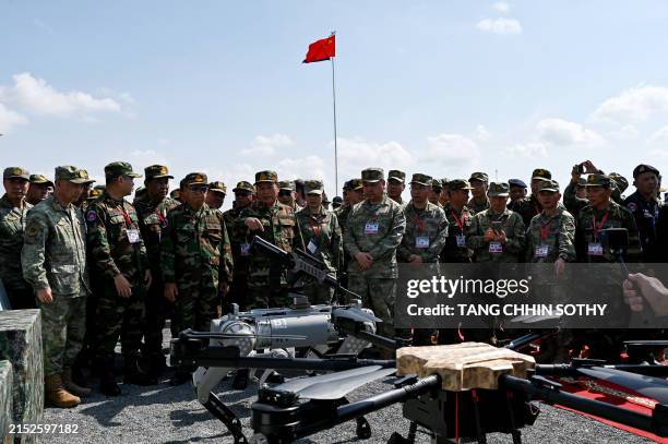 Commander-in-Chief of the Royal Cambodia Armed Forces Vong Pisen and Chinese People's Liberation Army Southern Theater Command's Gao Xiucheng attend...