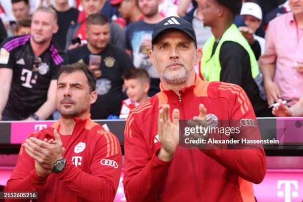 Thomas Tuchel, Head Coach of Bayern Munich, applauds prior to the Bundesliga match between FC Bayern München and VfL Wolfsburg at Allianz Arena on...