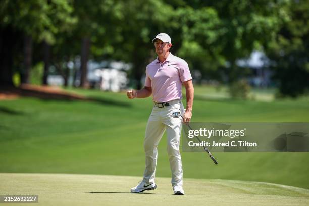Rory McIlroy of Northern Ireland reacts after making a par on the third hole during the final round of the Wells Fargo Championship at Quail Hollow...
