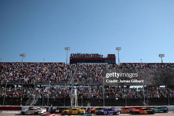 Brad Keselowski, driver of the Castrol Ford, leads the field during the NASCAR Cup Series Goodyear 400 at Darlington Raceway on May 12, 2024 in...