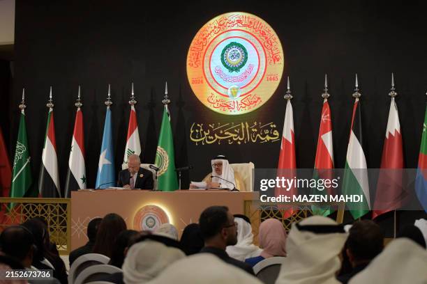 Arab League Secretary-General Ahmed Aboul Gheit and Bahrain Foreign Minister Abdullatif bin Rashid Al Zayani speak during a joint press conference at...