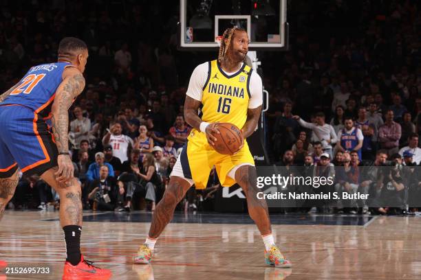 James Johnson of the Indiana Pacers looks to pass the ball during the game against the New York Knicks during Round 2 Game 5 of the 2024 NBA Playoffs...