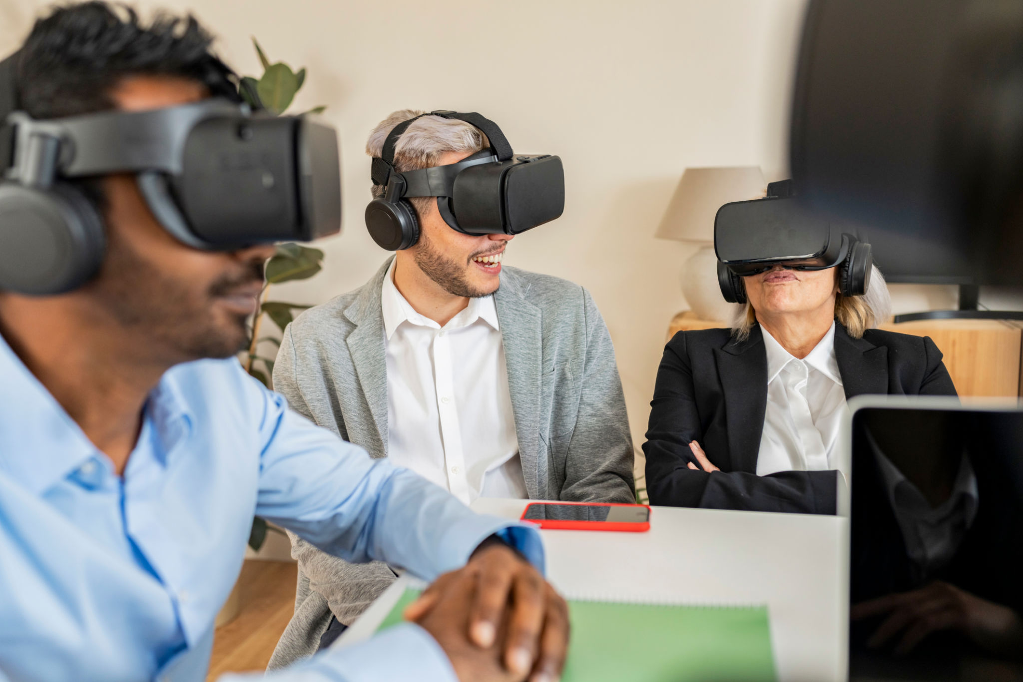 Corporate Team Experiencing Virtual Reality Technology Corporate Team Experiencing Virtual Reality Technology