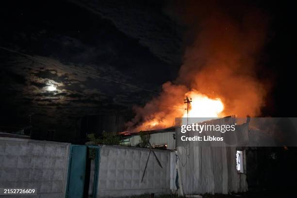 The administrative building is on fire after a Shahed-136 unmanned kamikaze drone attack on the railway infrastructure on May 17, 2024 in Kharkiv,...