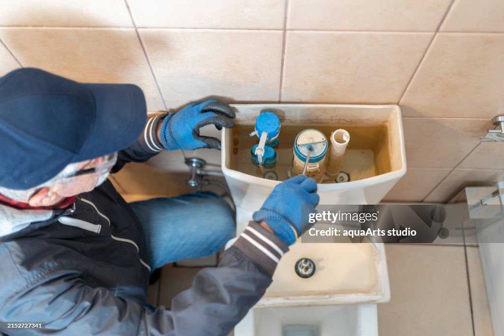 Plumbing Repair Service In A Bathroom