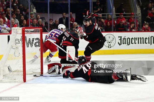 Carolina Hurricanes Left Wing Jordan Martinook stops the puck from crossing the goal line during game six of the Eastern Conference Second Round...