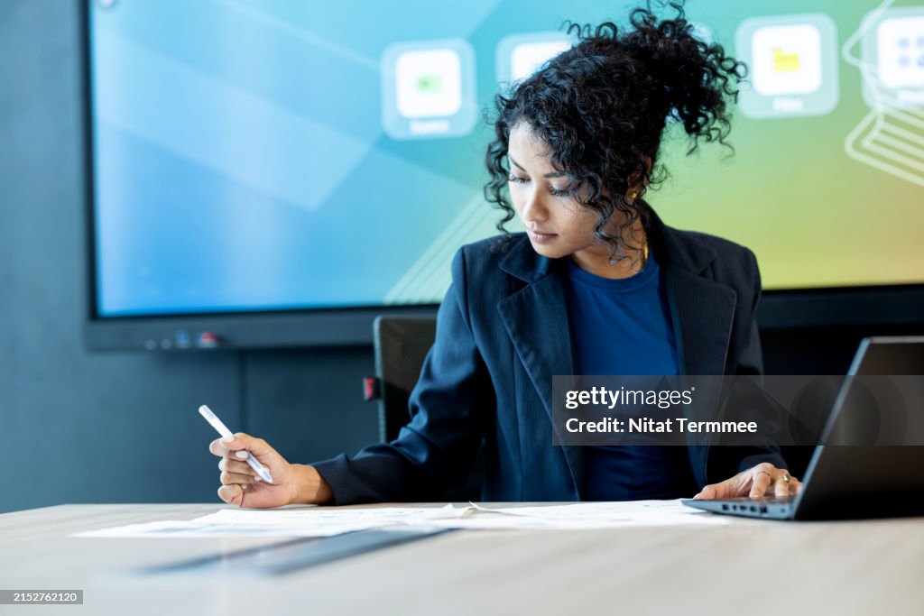 Plan a roadmap for the future with strategic financial planning for your business. A chief financial officer review a financial planning for business process to drive business operation in an office.